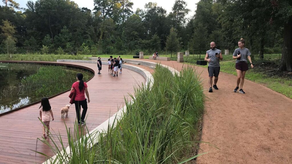 Two central terraces and the boardwalk over views of the lake.