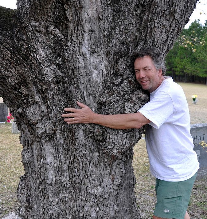 Johnny’s tree hugging ways brought him to the world of conservation after starting his career in academia.