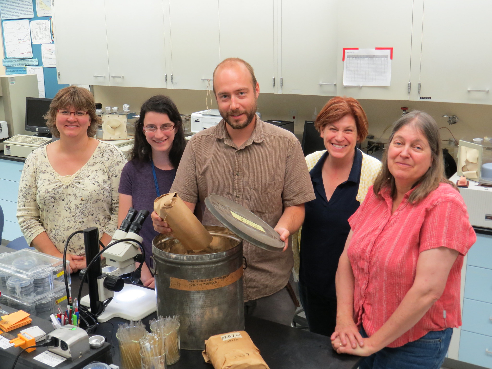 Group shot of Evan Meyer, then seed bank manager at Rancho Santa Ana Botanic Garden (center), and high school intern Veronica Sondervan (second from left) joined NLGRP staff in testing a batch of seed in 2014.