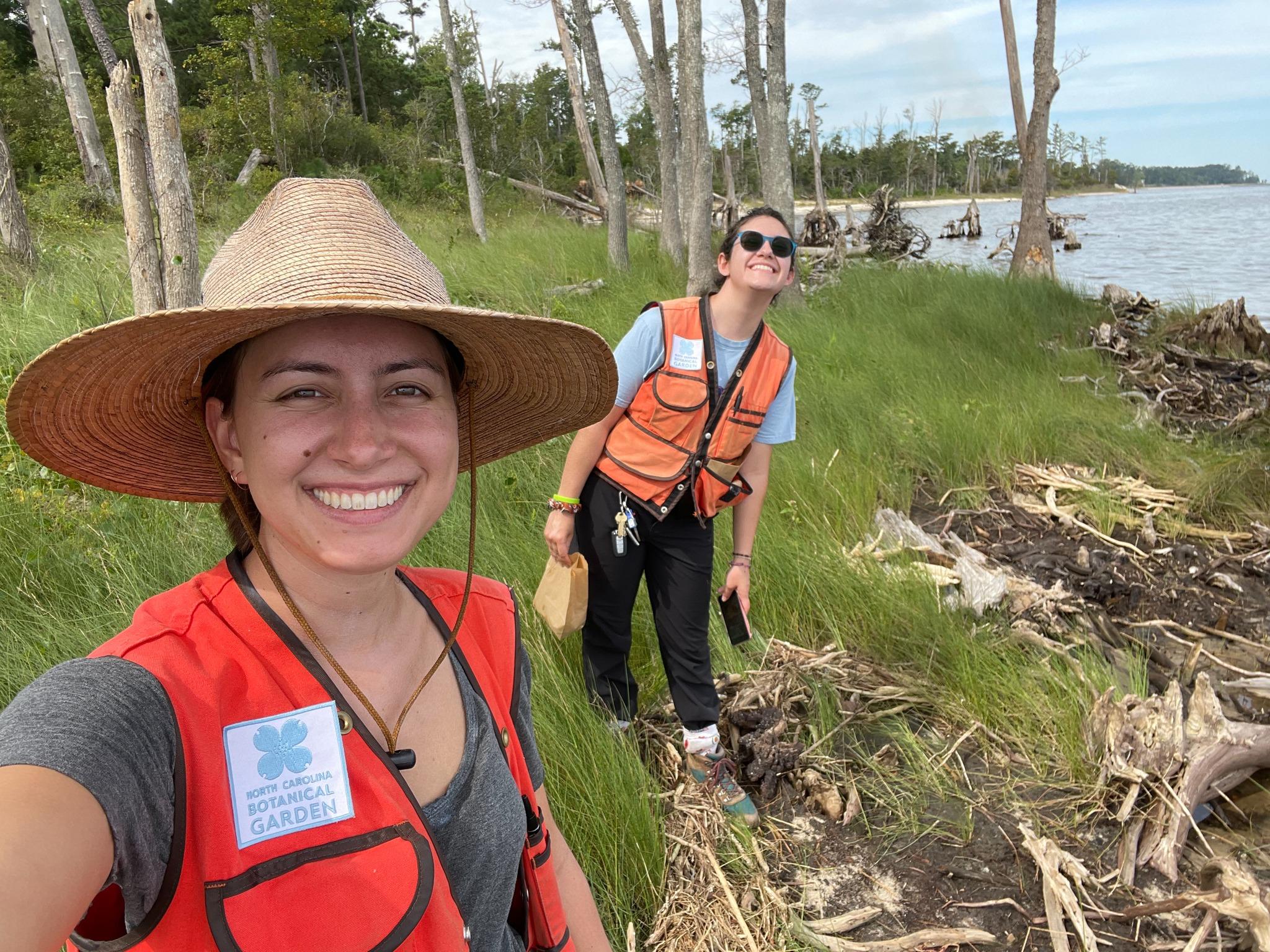 Our 2022 Plant Conservation Technicians, Madison and Aria, on a seed collecting trip in the Coastal Plain.